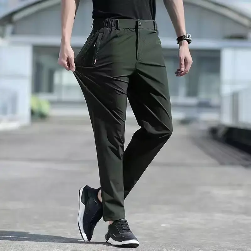 ผู้ชายขนาดใหญ่ฤดูร้อนกางเกงขนาดใหญ่ผ้าไหมยืด Breathable ตรงขากางเกง6XL Quick Dry Elastic Band กางเกงขายาวสีดำ