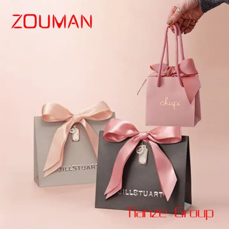 Bolsa de papel de embalaje de joyería impresa personalizada, bolsas de compras de papel artístico de regalo de lujo con su propio logotipo