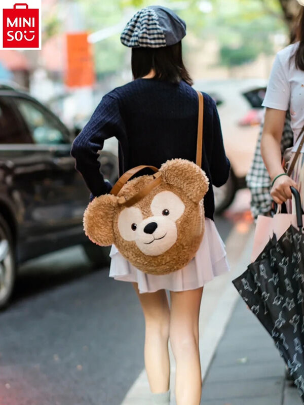 MINISO Disney Zhao Lusi Duffy Bear Big face bolsa de muñeca de dibujos animados versátil estudiante de felpa dulce mochila para niños Lindo bolso de mano regalo