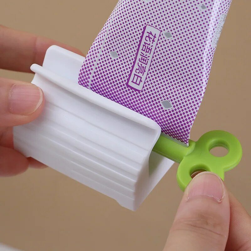 Mini tubo rodante dispensador de pasta de dientes, soporte de asiento, de fácil limpieza productos de baño, exprimidor de cosméticos para el hogar