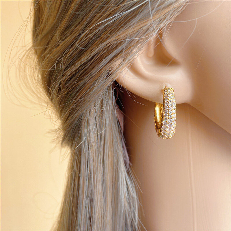 Huitan-pendientes de aro de CZ pavimentados de lujo para mujer, Color dorado, diseño ahuecado, temperamento femenino, accesorios para la oreja, joyería de moda