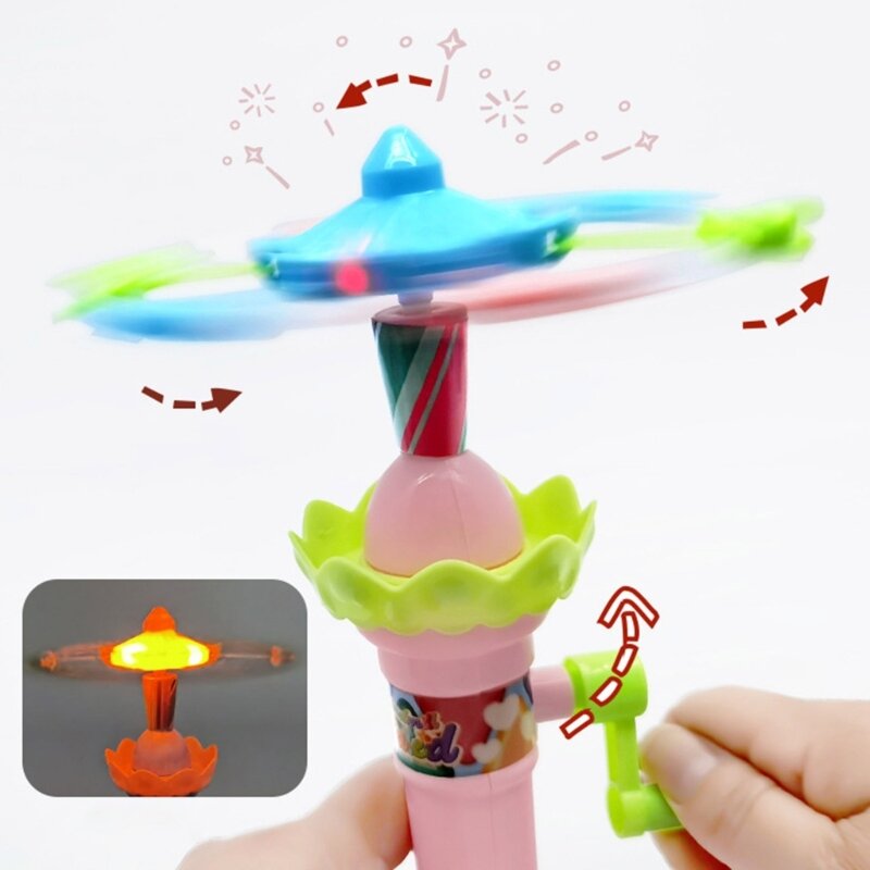 Handgekurbeltes rotierendes Karussellspielzeug mit LED-Lichtern, leuchtendes Spielzeug (zufällige Farbe)
