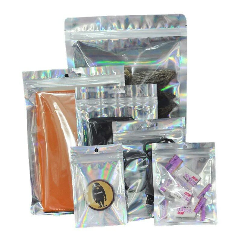プラスチック製の虹色のジッパーロックバッグ、化粧ポーチ、レーザーバッグ、ホログラフィック化粧収納バッグ、ziplockバッグ、ギフト包装、50個
