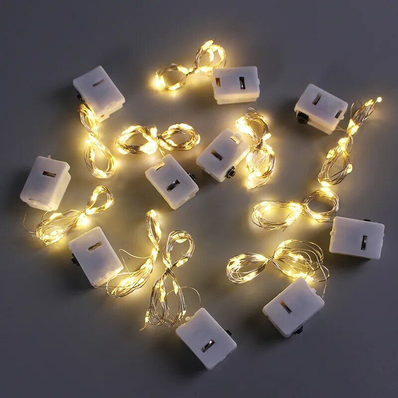 Tira de luces LED de cobre con batería, 12 piezas, 10/20LED, para boda, fiesta de Navidad, decoración de flores, paquete de bolsa Opp