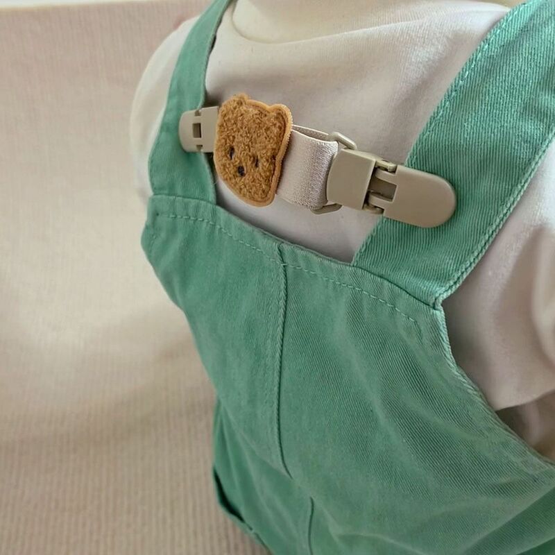 Grampo antiderrapante ajustável do urso para o bebê, calças cinta, suspensórios, grampo do ombro, saia, forma