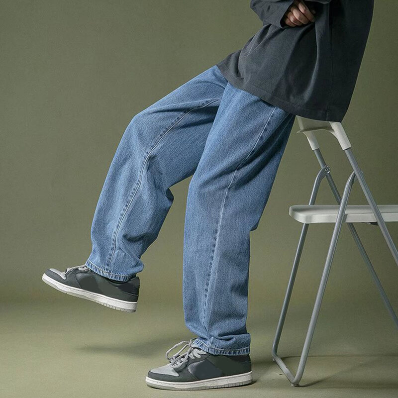 Męskie spodnie z szerokimi nogawkami koreańskie spodnie studenckie z prostym workowate dżinsy i elastycznym stanem