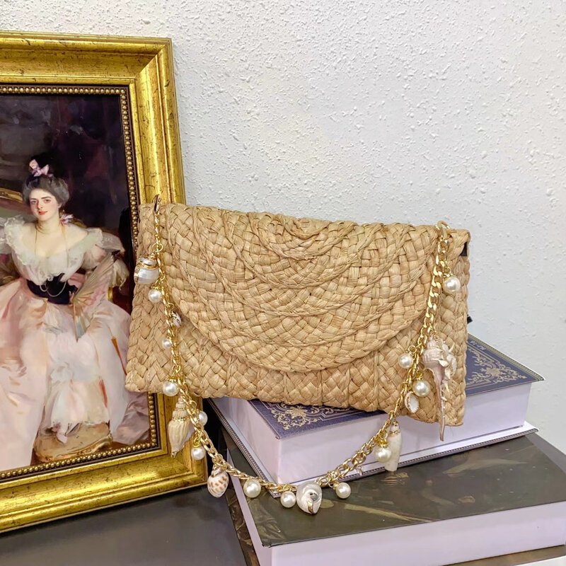 Bolso de paja con perlas de concha bohemias para mujer, bandolera de mimbre tejida a mano, de lujo, para viaje y playa, 2024