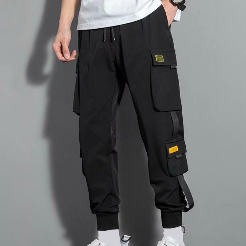 Pantalones Cargo multibolsillos con decoración de cinta para hombre, ropa de calle con cordón en la cintura, talla grande