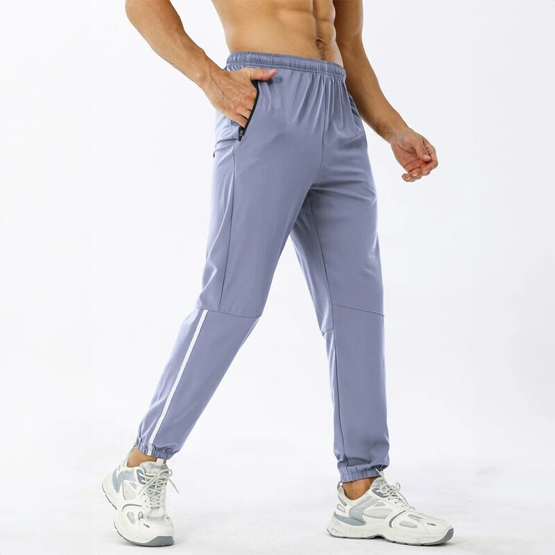กางเกงออกกำลังกายของผู้ชายกางเกงลำลองเอวยางยืดสำหรับยิม celana joger กางเกงลำลองทรงหลวมมีลายแบบใหม่