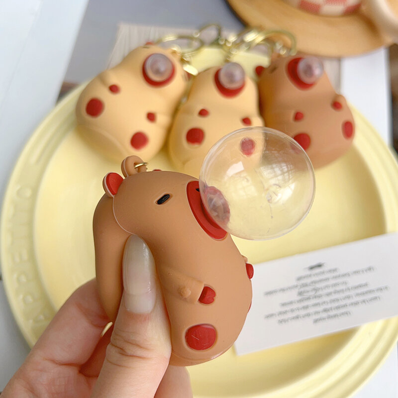 Cute Capybara Squeezes and Spits Bubbles per decomprimere la catena chiave giocattoli zainetto per bambini ciondolo bambola gioielli portachiavi