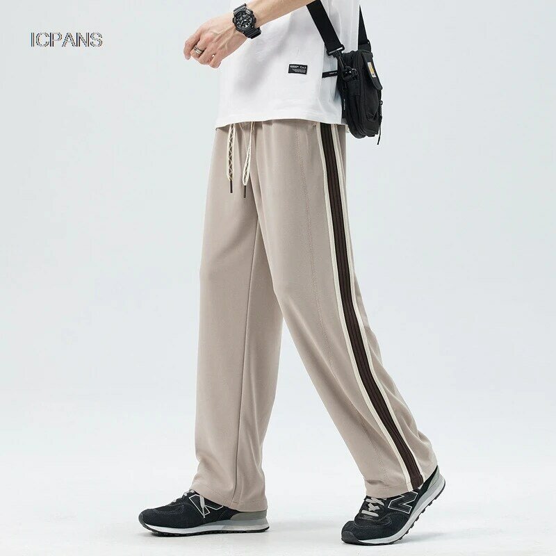 Celana olahraga pria Fashion Korea, celana panjang kaki lebar longgar pria, celana olahraga kasual tali pinggang 2024 musim semi musim panas