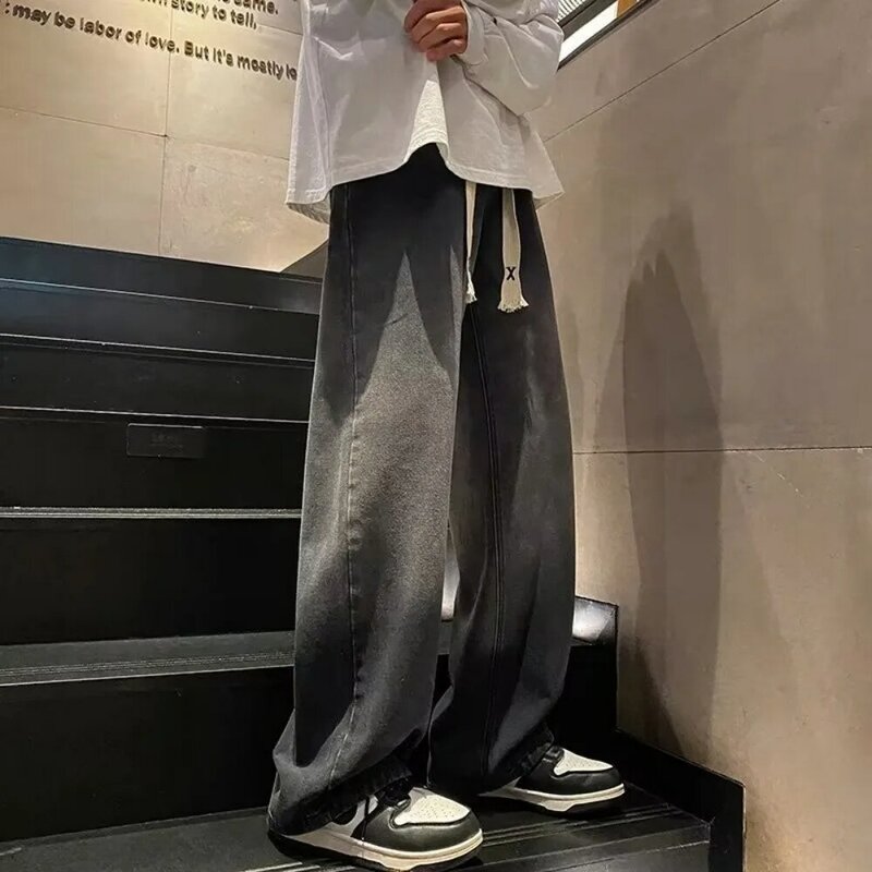 Celana panjang Jeans desain gradien Retro pria, celana gelombang model kasual kaki lebar longgar Musim Panas 2024 untuk pria