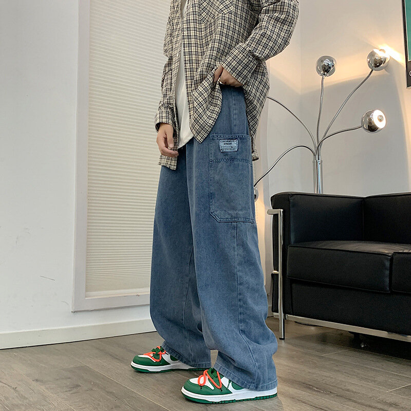Workwear celana lurus pria, Jeans longgar Fitting trendi High Street pria Ins Vintage Patch saku kaki lebar pel celana Ayah
