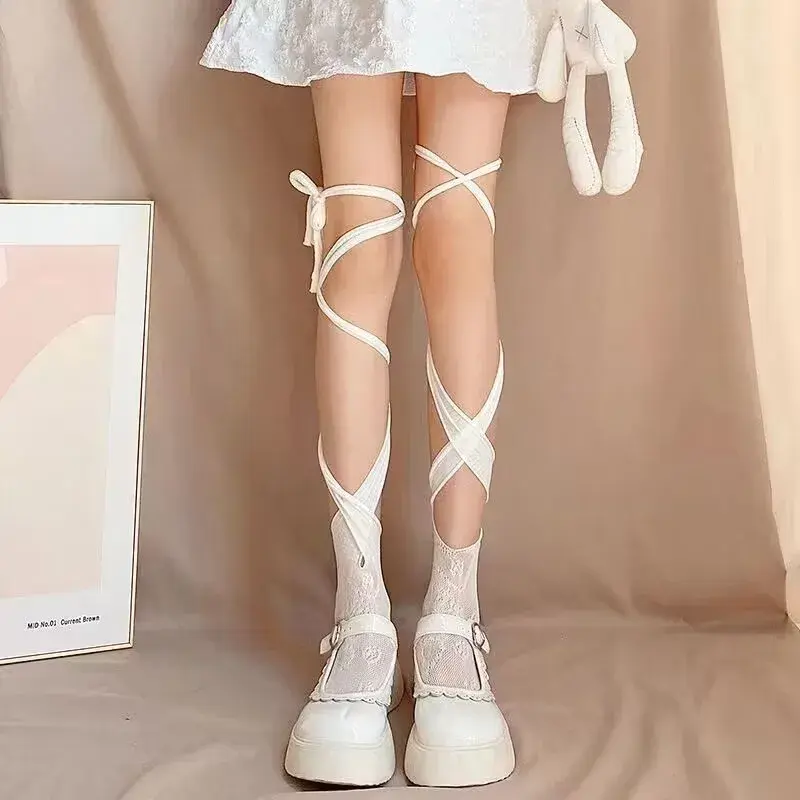 Medias de rejilla de encaje Floral con corazón para mujer, calcetines de media pantorrilla irregulares, calcetines largos japoneses de tubo medio con lazo Jk, Sexy