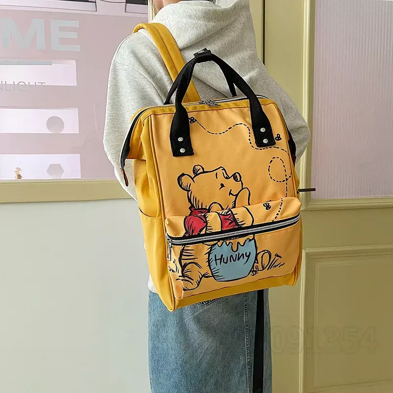 Disney Winnie The Pooh ใหม่กระเป๋าผ้าอ้อมกระเป๋าเป้สะพายหลังการ์ตูนน่ารักแม่กระเป๋าขนาดใหญ่ความจุน้ำหนักเบา Mommy กระเป๋า