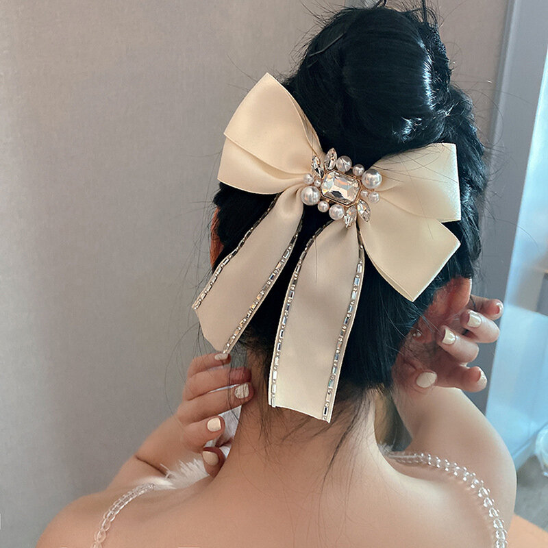 Nowe eleganckie nakrycia głowy na kucyk dla kobiet kokardy spinki do włosów z perłą zacisk sprężynowy akcesoria do włosów kryształ