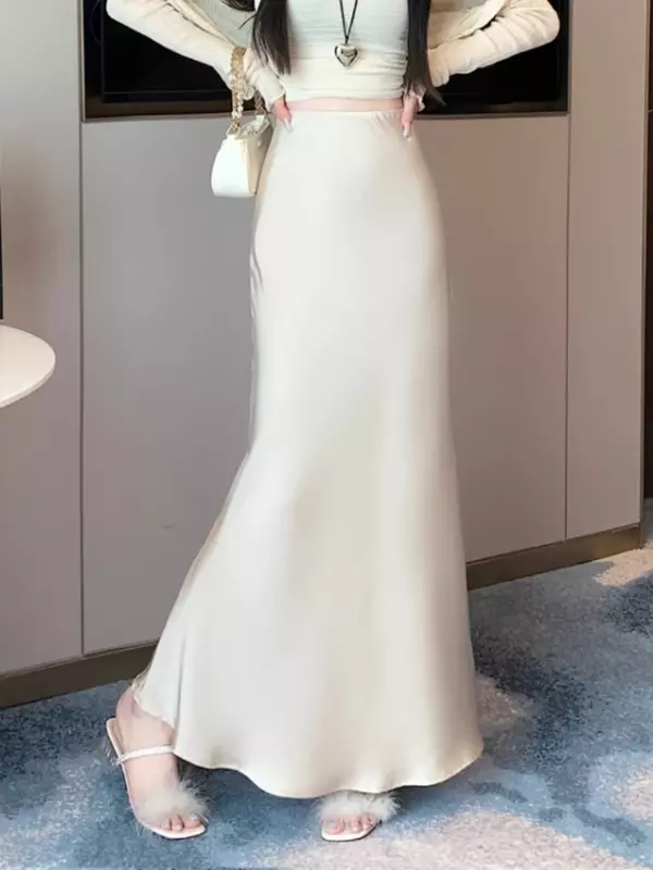 Letnia satynowa spódnica 2024 damska długa spódnica jedwabna z wysokim stanem szczupła moda koreańska jednolita szampańska czarna spódnice Midi dla kobiet