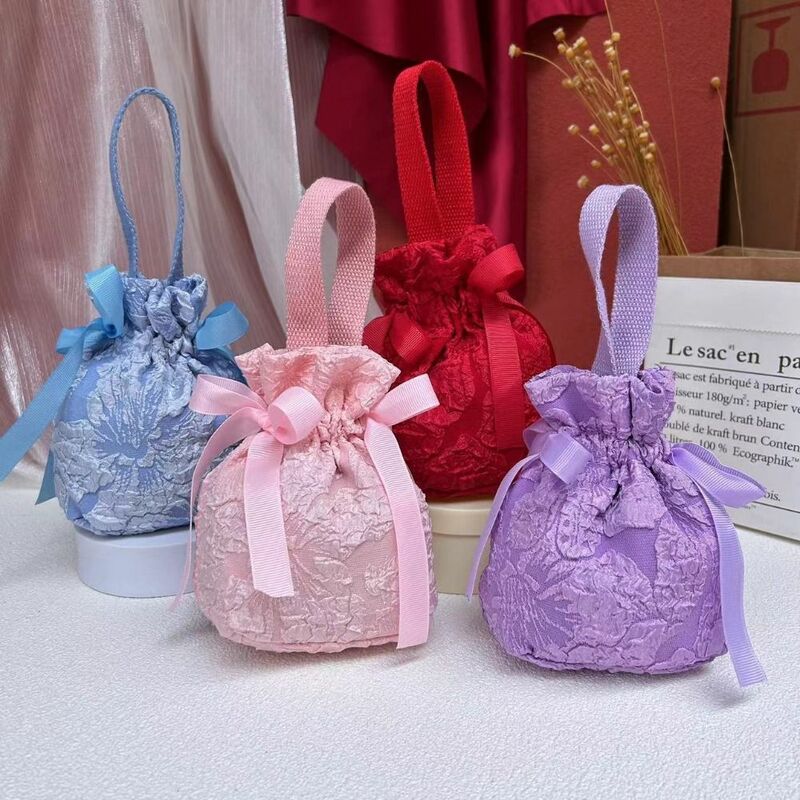 Borsa con coulisse floreale in tela con fiocco in raso borsa da polso con fiore in rete di grande capacità borsa da polso in stile coreano