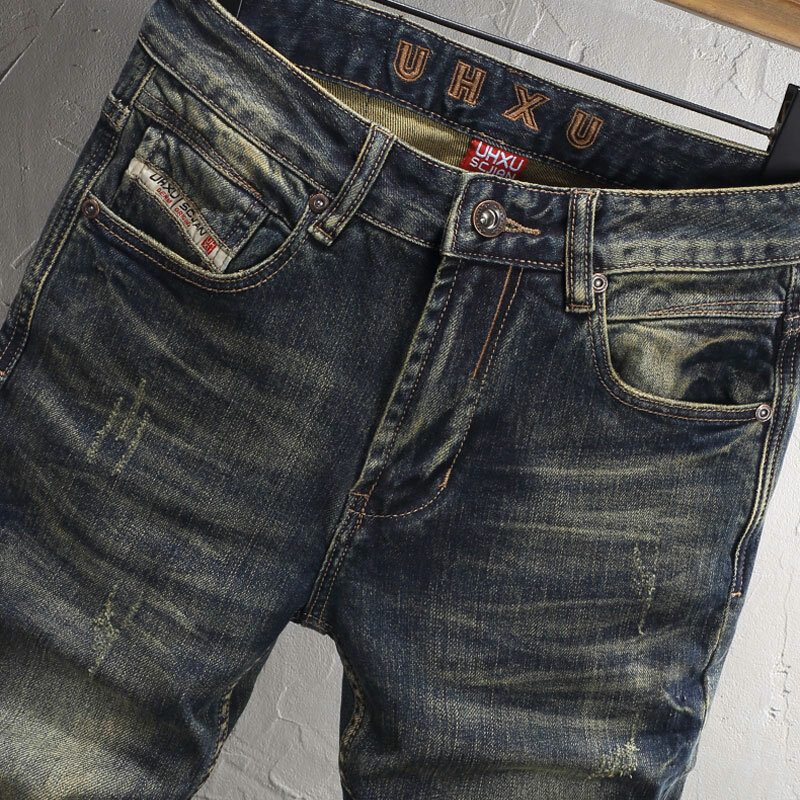 Modne designerskie męskie jeansy wysokiej jakości Retro sprany niebieski rozciągliwe dopasowanie pasujące porwane jeansy mężczyzn włoski styl spodnie dżinsowe Vintage