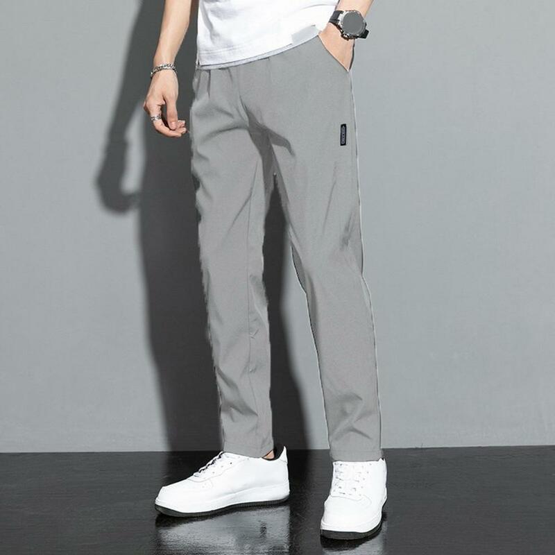 Calça casual elástica de secagem rápida masculina, calça reta longa, cintura média fina, cor sólida solta