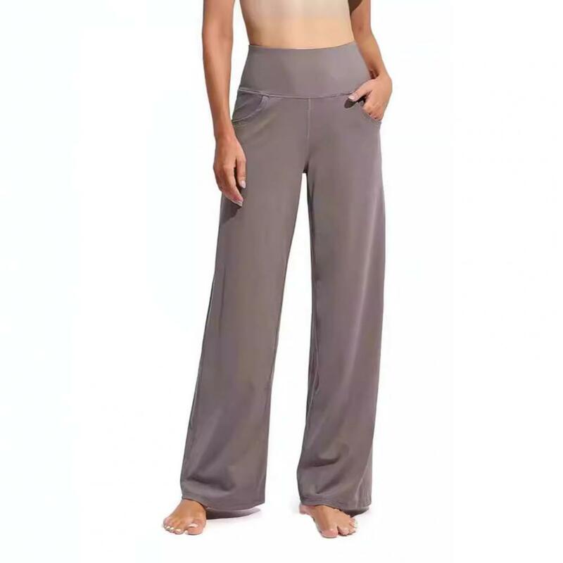 Calça feminina de ioga de cintura alta com bolsos laterais, calças largas, ajuste solto, elegante, controle de barriga, casual