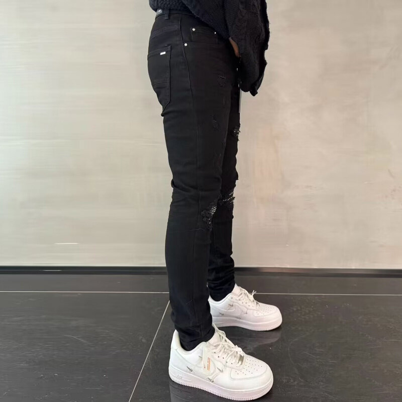 Modne dżinsy męskie uliczna czarna rozciągliwa chudy krój porwane jeansy z koralikami łatany projektant Hip Hop markowe spodnie mężczyzn spodnie punkowe