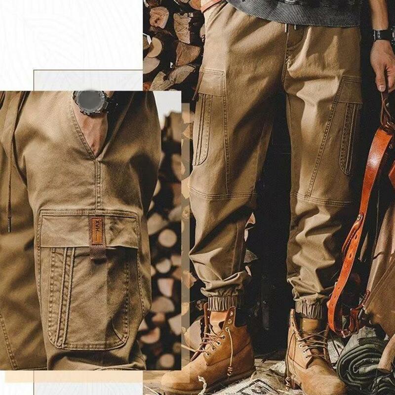 Calças de carga multi bolsos masculinas com múltiplos bolsos, cintura elástica, design de bandas de tornozelo para exterior, streetwear