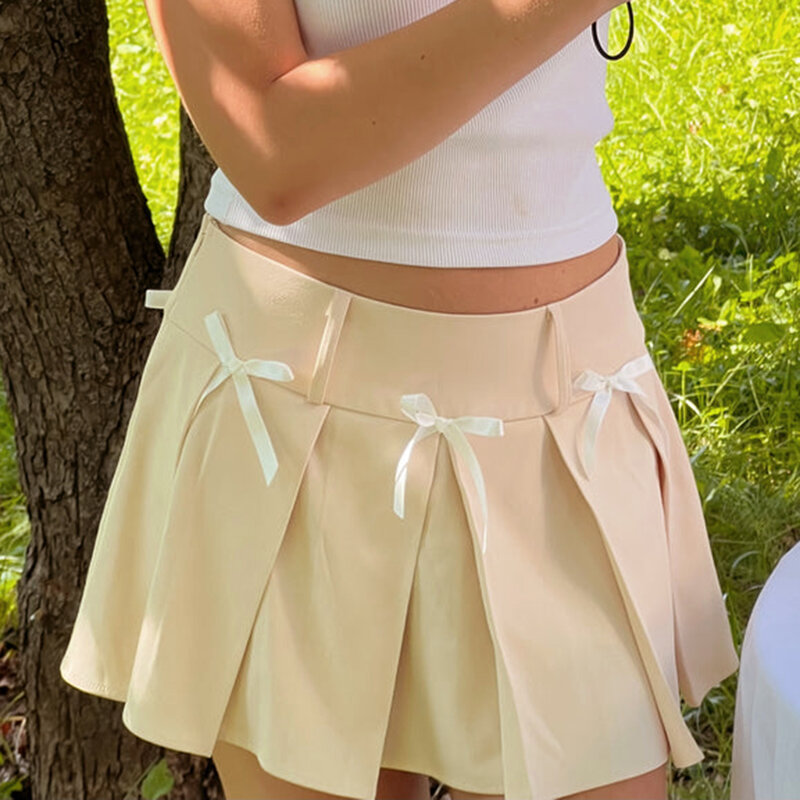 Letnia damska plisowana spódnica na co dzień urocza Mini spódniczka z kokardą na wakacje na plaży w stylu Streetwear estetyczne ubrania