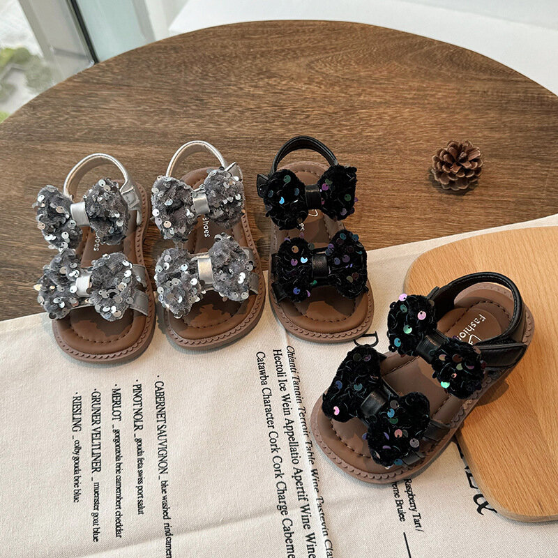 Sandali da bambina estivi 2024 con fiocco e Glitter moda stile coreano Open-toe comode scarpe da spiaggia dolci da principessa