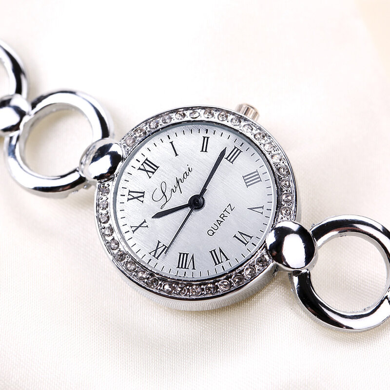 นาฬิกาผู้หญิงแฟชั่นใหม่นาฬิกาควอตซ์สายสแตนเลสนาฬิกาประดับหินไรน์สโตนหรูนาฬิกาข้อมือชุดสุภาพสตรี