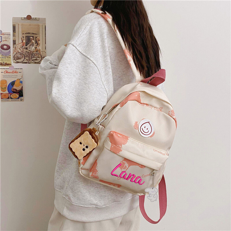 Spersonalizowany spersonalizowany plecak dla kobiet z uśmiechem i wszechstronnym plecakiem, minimalistyczny plecak z haftowaną nazwą studenta