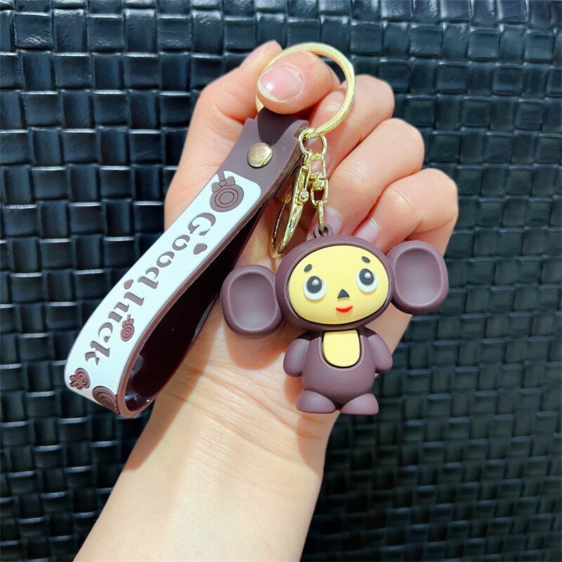 พวงกุญแจตุ๊กตาลิงยางนิ่มแบบน่ารักสร้างสรรค์พวงกุญแจคอสเพลย์หนัง Cheburashka อินเทรนด์สัตว์พวงกุญแจจี้ของขวัญเทศกาล