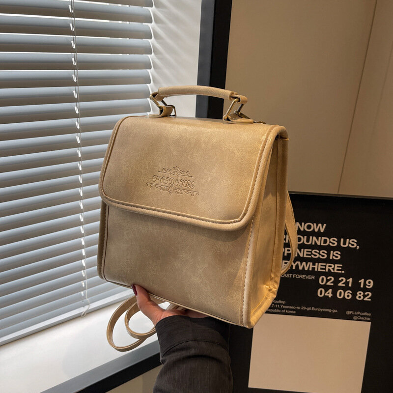 Bolso pequeño de mano para mujer, mochila de viaje con textura cuadrada, versátil, a la moda, novedad de 2024