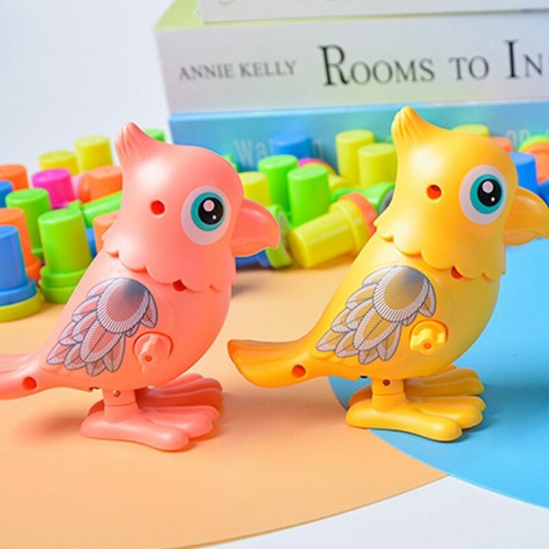 Mainan hewan beo angin mainan lucu plastik hijau/merah muda klasik rantai jam mainan orang tua-anak