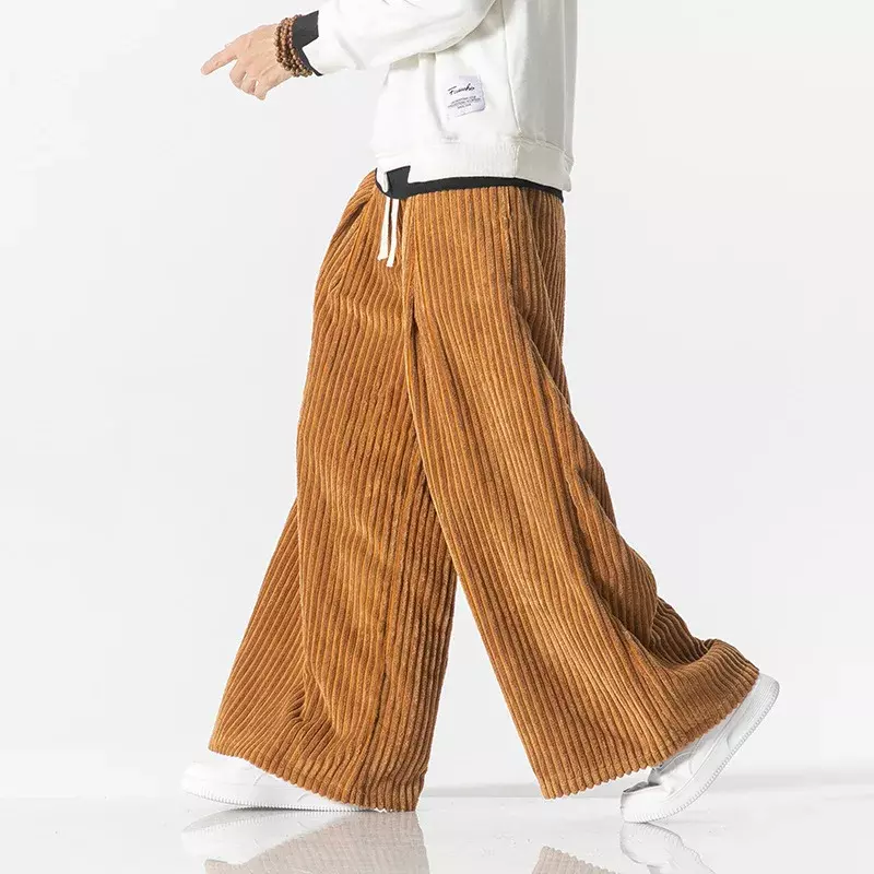 Pantaloni Casual da uomo Harajuku Solid Male Harem Pants velluto a coste Oversize sciolto moda uomo donna pantaloni Jogger Streetwear 5XL