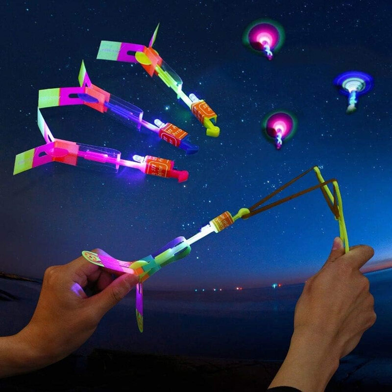 Nuovo 50/30/10/5/1Pc incredibile luce giocattolo freccia razzo elicottero giocattolo volante giocattoli luminosi a LED regali divertenti per feste catapulta con elastico