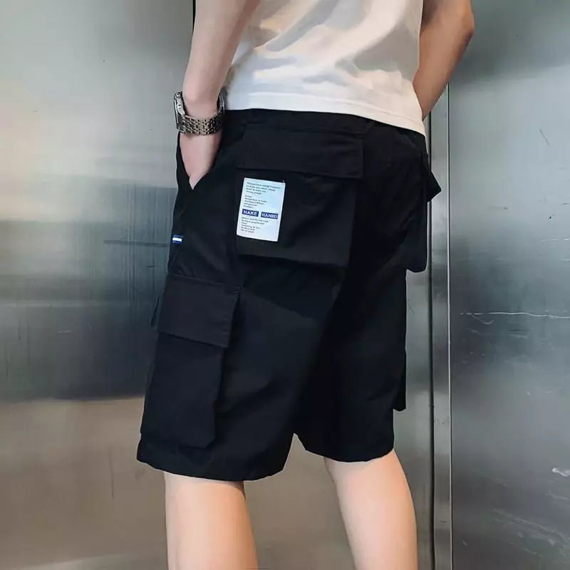 Męskie szorty bojówki czarne z kieszeniami męskie bermudy krótkie spodnie Harajuku luźna odzież uliczna designerska elastyczna talia darmowa wysyłka