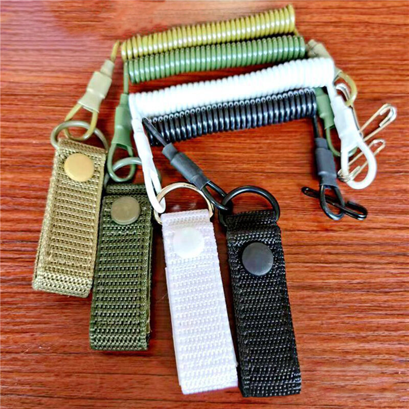 Cordón elástico táctico antipérdida, correa de seguridad de resorte militar, cuerda de pistola para llavero, cadena, linterna, accesorios de caza
