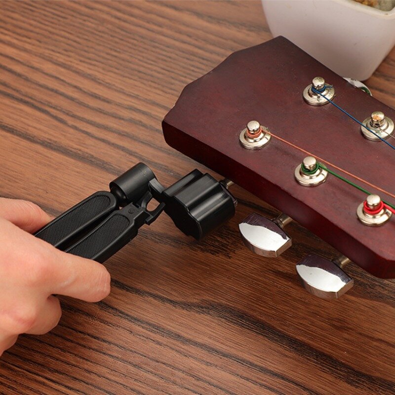 Herramienta de afinación de guitarra 3 en 1, accesorios para instrumentos de cuerda, cortador de cuerdas, tirador de Pin, enrollador de guitarra, removedor de abrazadera de cuerda