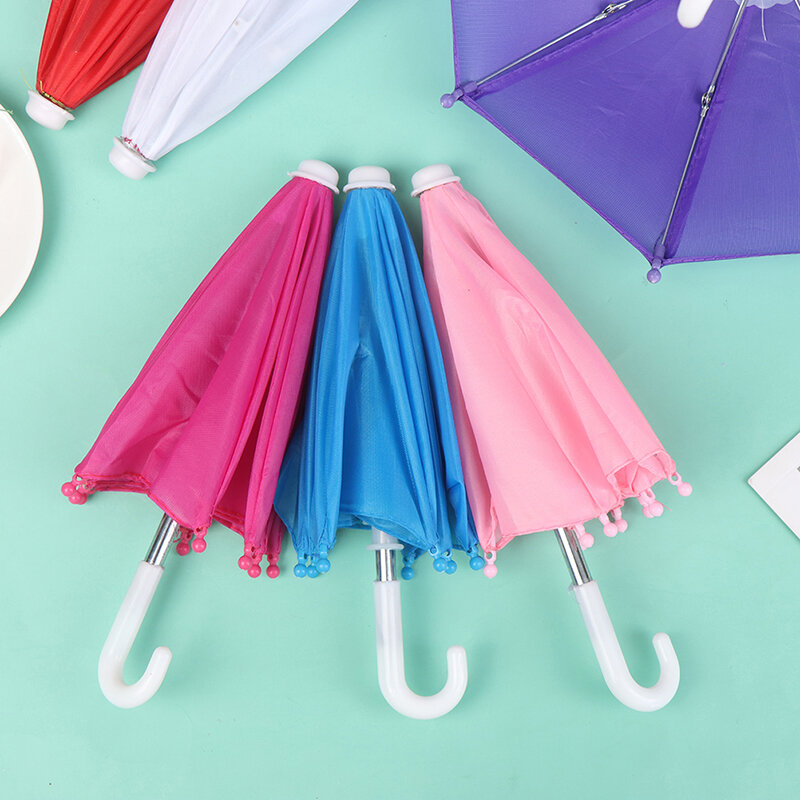 Akcesoria dla lalek zabawki dla dziewczynek Mini parasol sprzęt przeciwdeszczowy dla 18 cal lalki Bjd akcesoria 22CM kolorowe parasole lalki zabawki dla dzieci