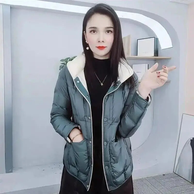 2022 Winter Neue Frauen Kurzen Abschnitt Unten Baumwolle Jacke Weibliche Mode Neue Koreanische Licht Dünne Baumwolle Gefütterte Jacke Starke Warme hecht