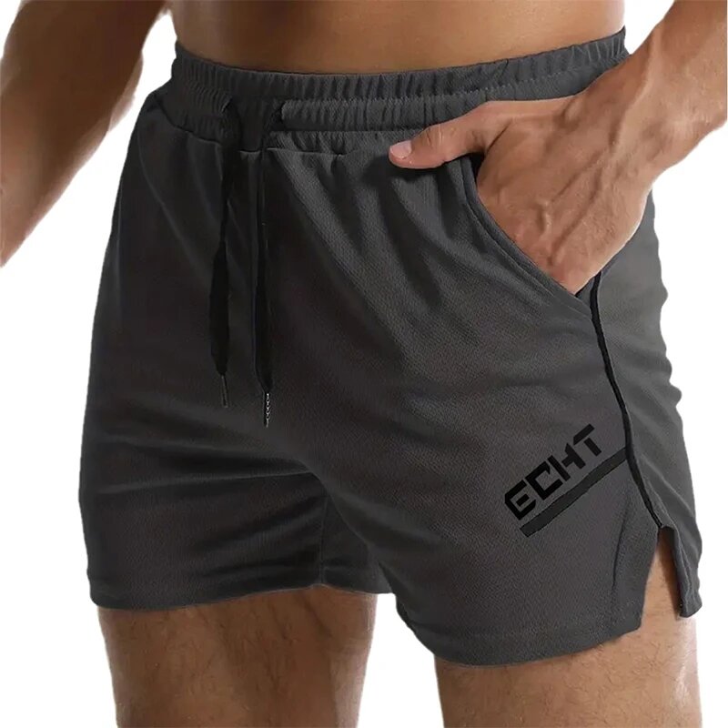 Celana pendek olahraga kebugaran pria, celana pendek pantai jala bernafas cepat kering musim panas untuk lelaki