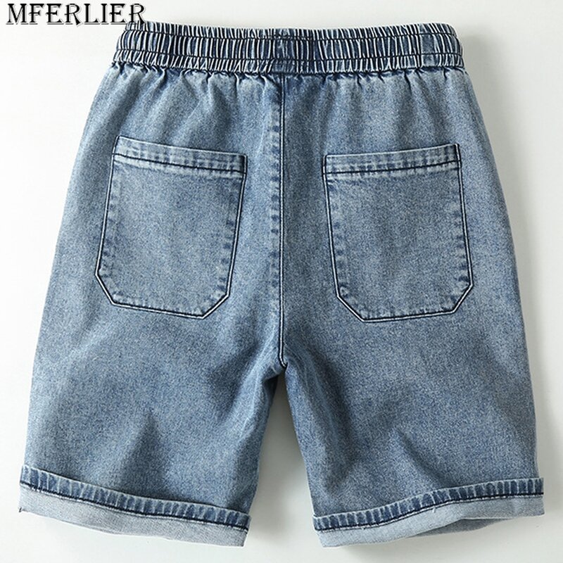 Jeansowe szorty męskie niebieskie spodenki dżinsowe moda na co dzień jednolity kolor spodenki dżinsowe męska elastyczna talia krótkie spodnie letnie