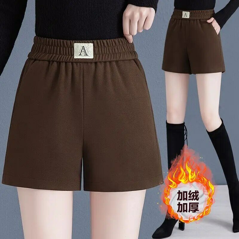 MODE Korea หนาฤดูหนาวสำหรับผู้หญิงเสื้อผ้าผู้หญิงสีทึบลำลองใหม่เรียบง่าย2024กางเกงขาสั้นตรงกางเกงขาม้ามีกระเป๋า