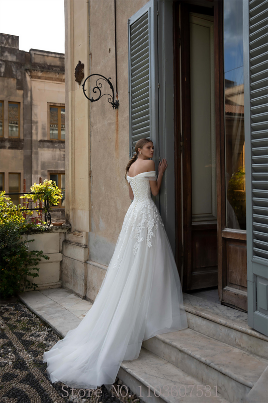 Off the Shoulder Tulle Applique renda gaun pernikahan untuk wanita A-line Backless renda istana gaun pengantin vestido de novias 2024