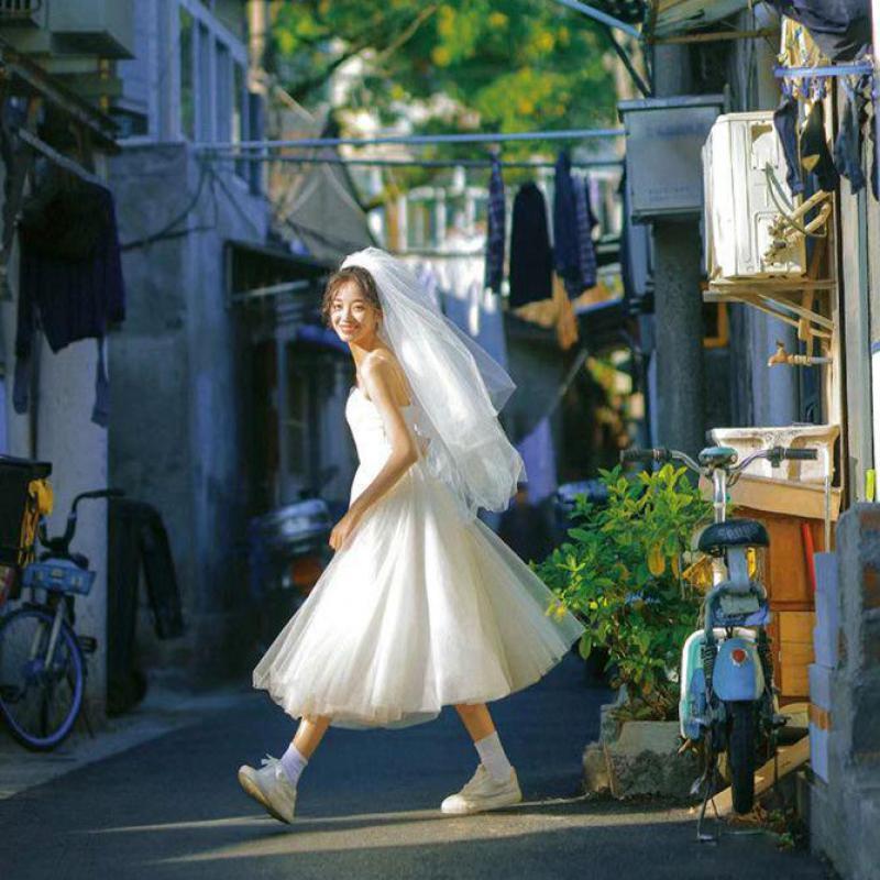 Süße kurze Bräute Brautkleider einfache Spaghetti träger Tüll koreanisches Brautkleid klassisches Boots hals Brautkleid für Frau