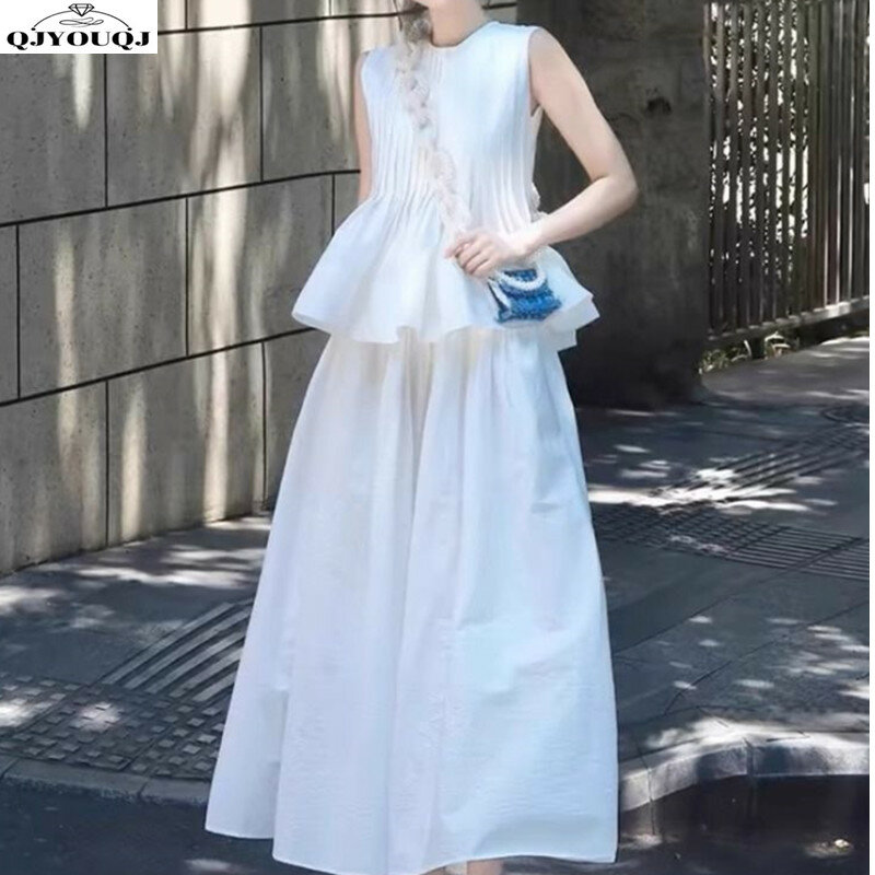 Conjunto de temperamento de estilo francés para mujer, Top sin mangas de primer amor, media falda de línea A, conjunto blanco de dos piezas