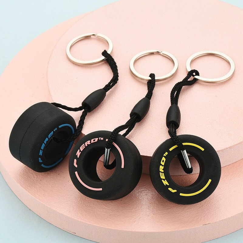 F1 Small Tire Keychain Ultra Soft Rubber Tire Key Ring Simulation Cartoon Small Tire Keychain For Car Decoration Accessories