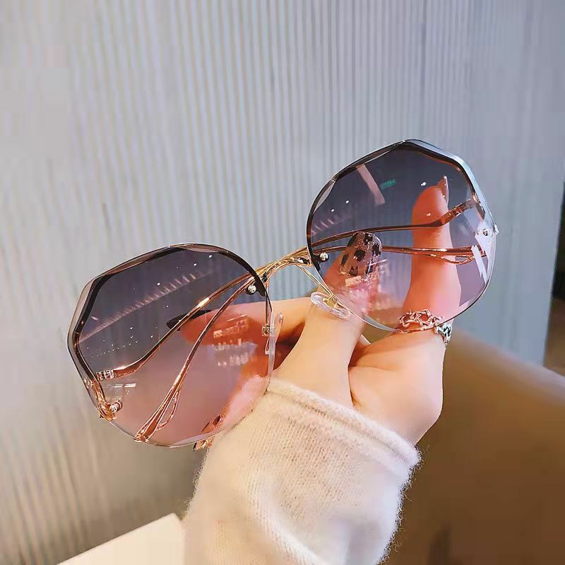 Kacamata hitam bulat gradien wanita, kacamata pelindung terik matahari Mode tanpa bingkai laut logam melengkung 2023