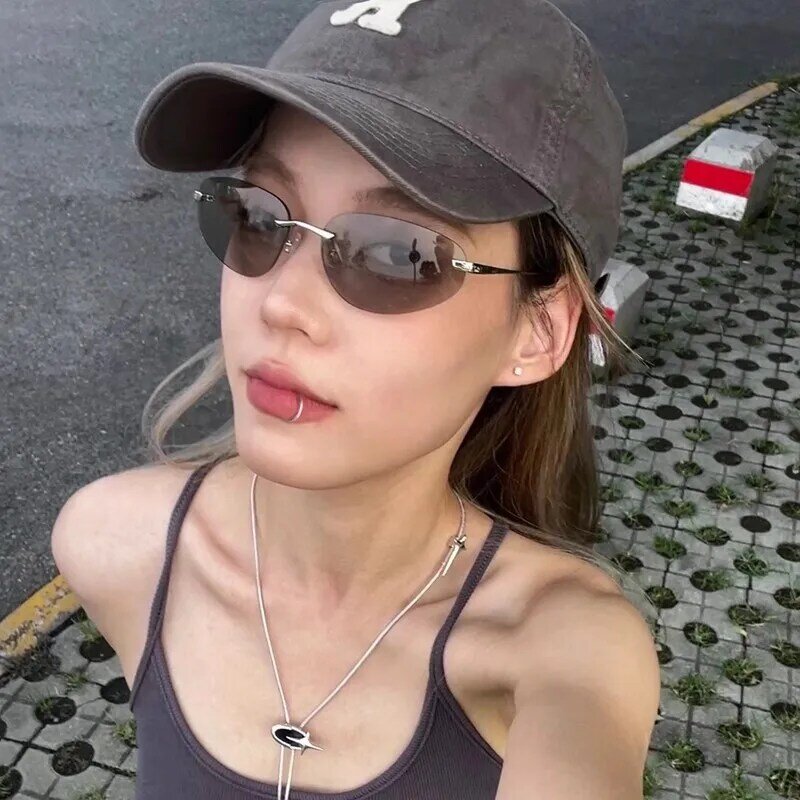 Korea Retro ovale rahmenlose Sonnenbrille Frau in Street Shot Sonnenschutz Brille staub dichte wind dichte Reit brille UV400 Sonnenbrille